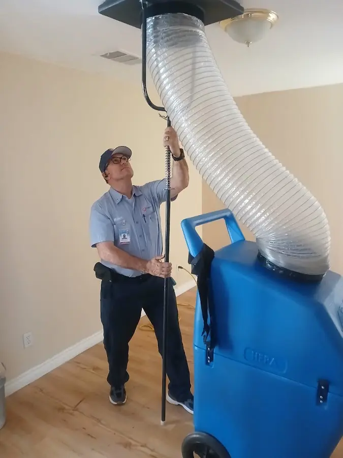 HVAC Installation technician using HEPA equipment in Oceola